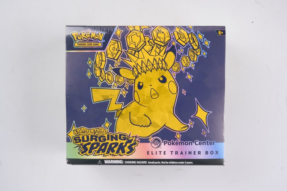 Pokemon Center Surging Sparks Elite Trainer Box - sealed: This lot contains a factory sealed Surging Sparks Pokemon Center ETB. The product comes with extar booster packs and a stamped promo. This item is perfectly sealed with no tears in the wrapping but so