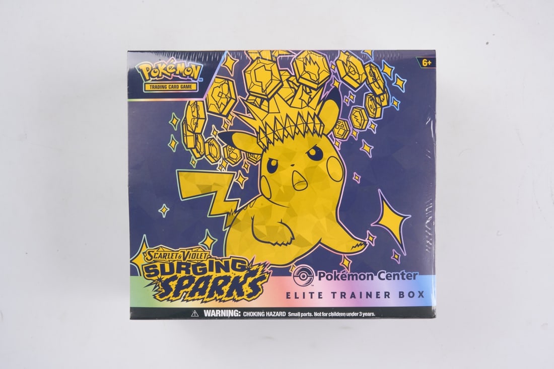 Pokemon Center Surging Sparks Elite Trainer Box - sealed: This lot contains a factory sealed Surging Sparks Pokemon Center ETB. The product comes with extar booster packs and a stamped promo. This item is perfectly sealed with no tears in the wrapping and pe