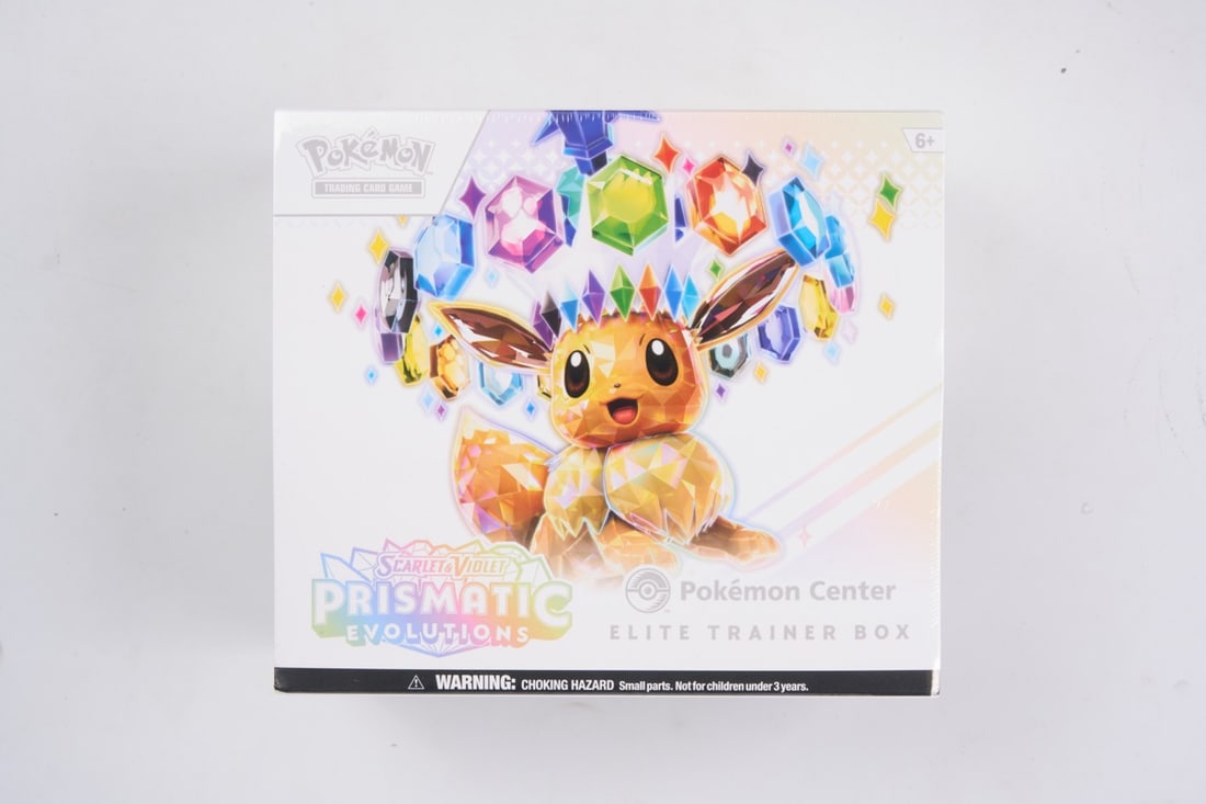 Pokemon Center Prismatic Evolutions Elite Trainer Box - Sealed: This lot contains a factory sealed Pokemon Center Prismatic Evolution ETB from the Scarlet & Violet era. The product comes with additional booster packs and a promo card. This item is perfectly sealed
