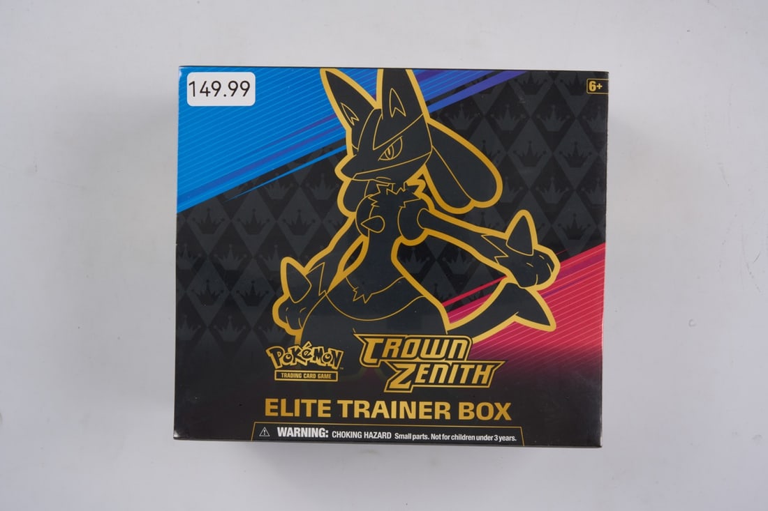 Crown Zenith Elite Trainer Box - Sealed: This lot contains a factory sealed Crown Zenith ETBThe item contains 9 sealed booster packs and the Lucario Vmax promo. The item is perfectly wrapped and in overall great condition but it does have a 