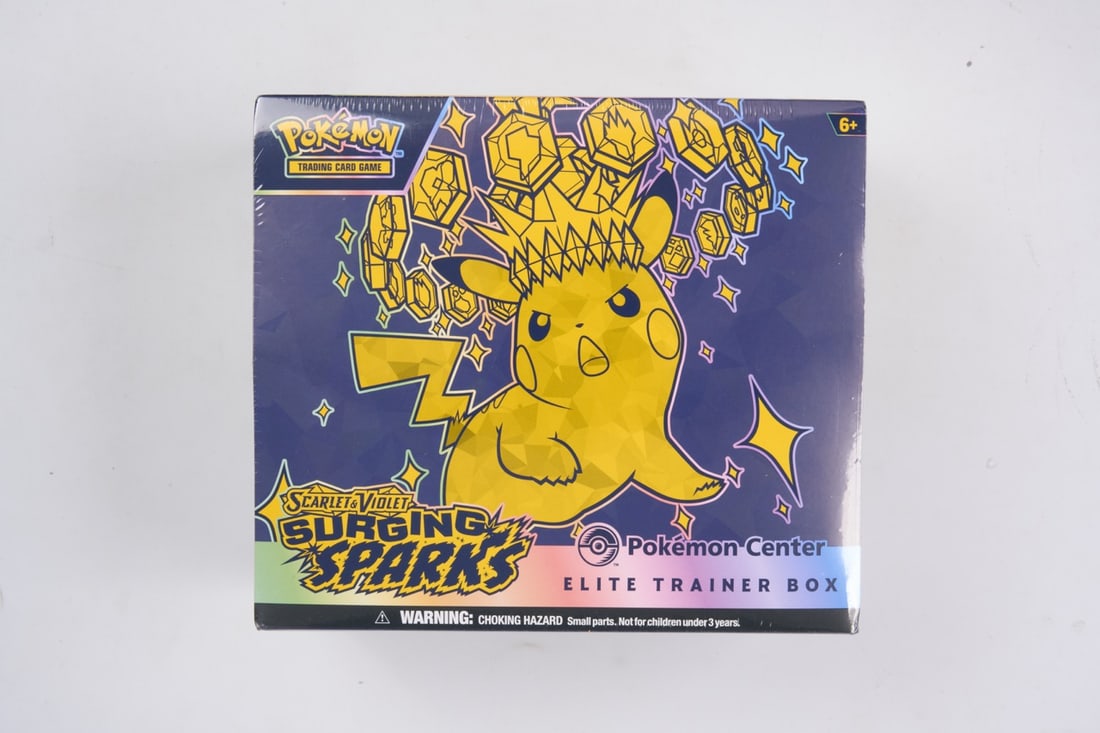Pokemon Center Surging Sparks Elite Trainer Box - sealed: This lot contains a factory sealed Surging Sparks Pokemon Center ETB. The product comes with extar booster packs and a stamped promo. This item is perfectly sealed with no tears in the wrapping and ov