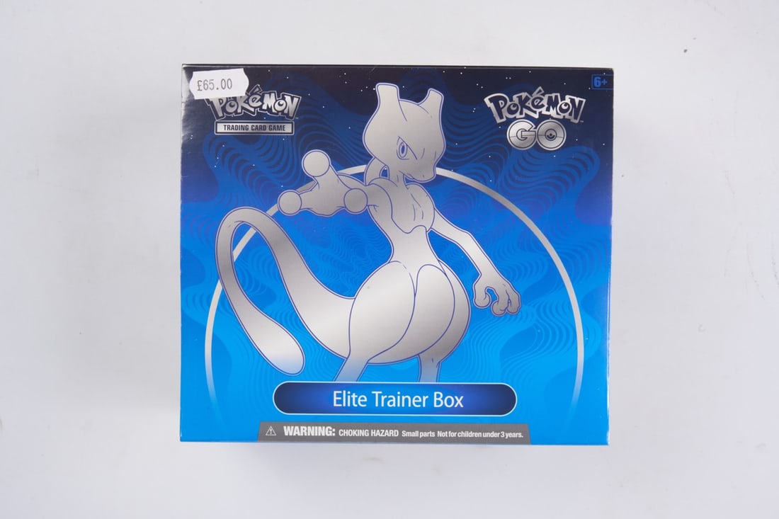 Pokemon GO Elite Trainer Box - Sealed: This lot contains a factory sealed Pokemon GO ETBThe item contains 10 sealed booster packs and the mewtwo promo. The item is perfectly wrapped, it does have a price sticker in the top left hand side o