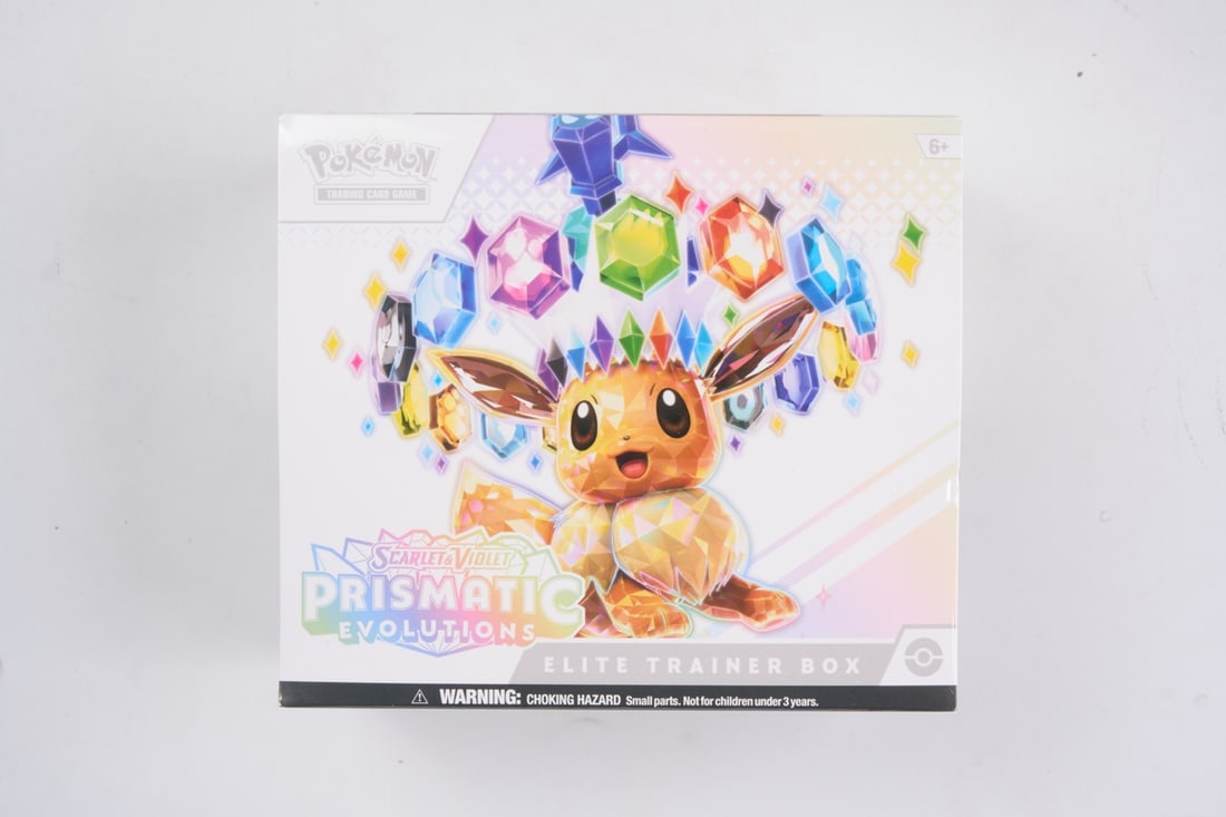 Prismatic Evolutions Elite Trainer Box - Sealed: This lot contains a factory sealed Prismatic Evolution ETB from the Scarlet & Violet era. The product comes with booster packs and a promoThis item is perfectly sealed with no tears in the wrapping an