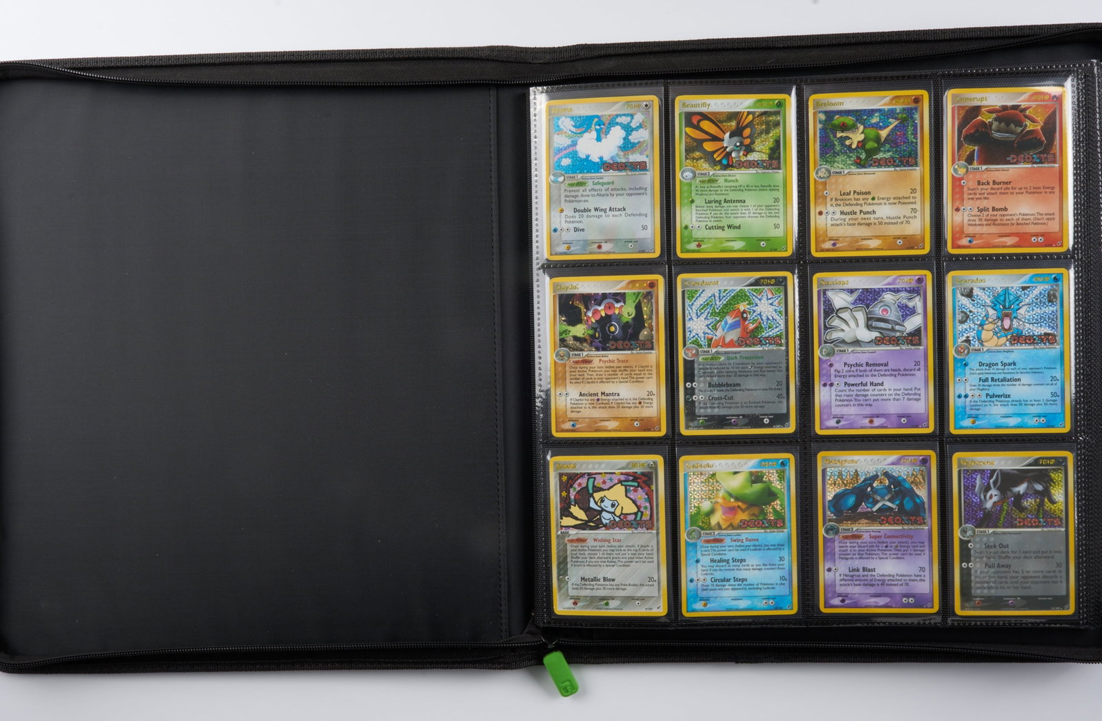 EX Deoxys Reverse Holo Complete Set - Avg. Condition NM: This lot features all the reverse holos from the EX Deoxys set, the eighth main expansion of cards from the EX Series released February 14, 2005. Also includes the Manectric #38 Prerelease stamped car