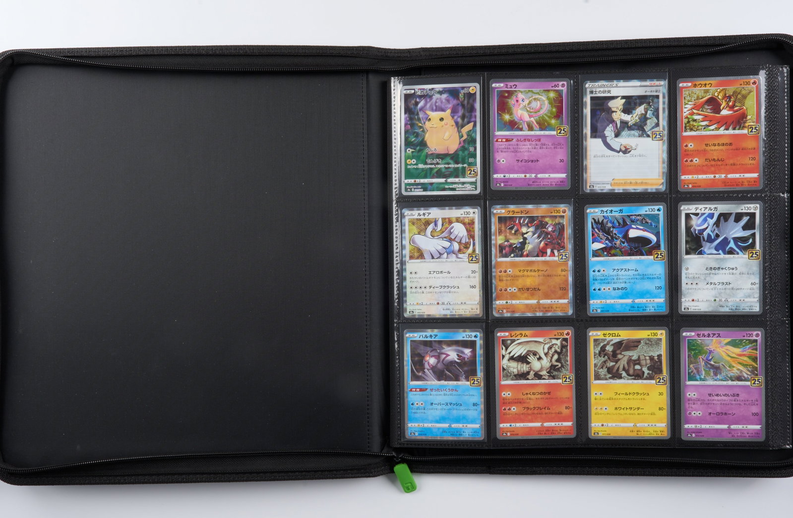 Pokemon TCG 25th Anniversary Japanese Celebrations Master Set Avg. Condition NM: Displayed in a 12 pocket Vault X Zip Binder this Master Set of the Japanese 25th Anniversary set (Celebrations in English) contains all 38 25th anniversary stamped cards and all cards that are part of