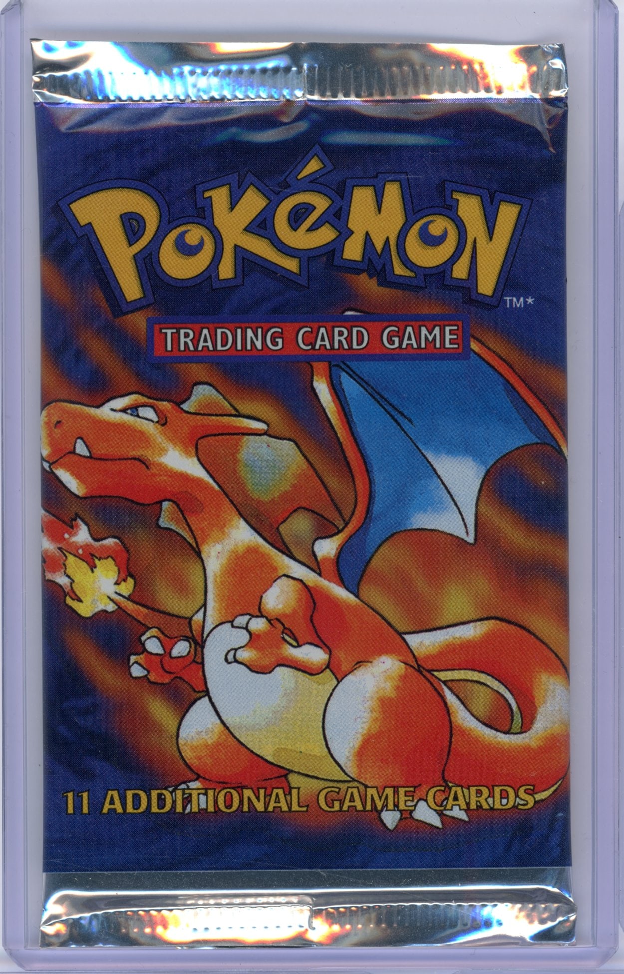 Base Set (1999) Sealed Booster Pack - Charizard Artwork (20.84g): A original 1999 Base Set Sealed Booster Pack, factory sealed and in excellent condition.This pack features the iconic Charizard Artwork, and comes in at 20.84 grams.