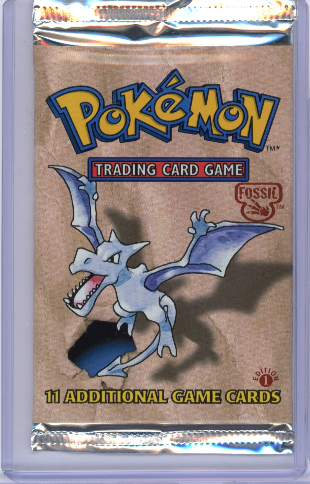 Fossil 1st Edition (1999) Sealed Booster Pack - Aerodactyl Artwork (20.88g): A original 1999 Fossil 1st Edition printing Sealed Booster Pack, factory sealed and in excellent condition.This pack features the iconic Aerodactyl Artwork, and comes in at 20.88 grams.