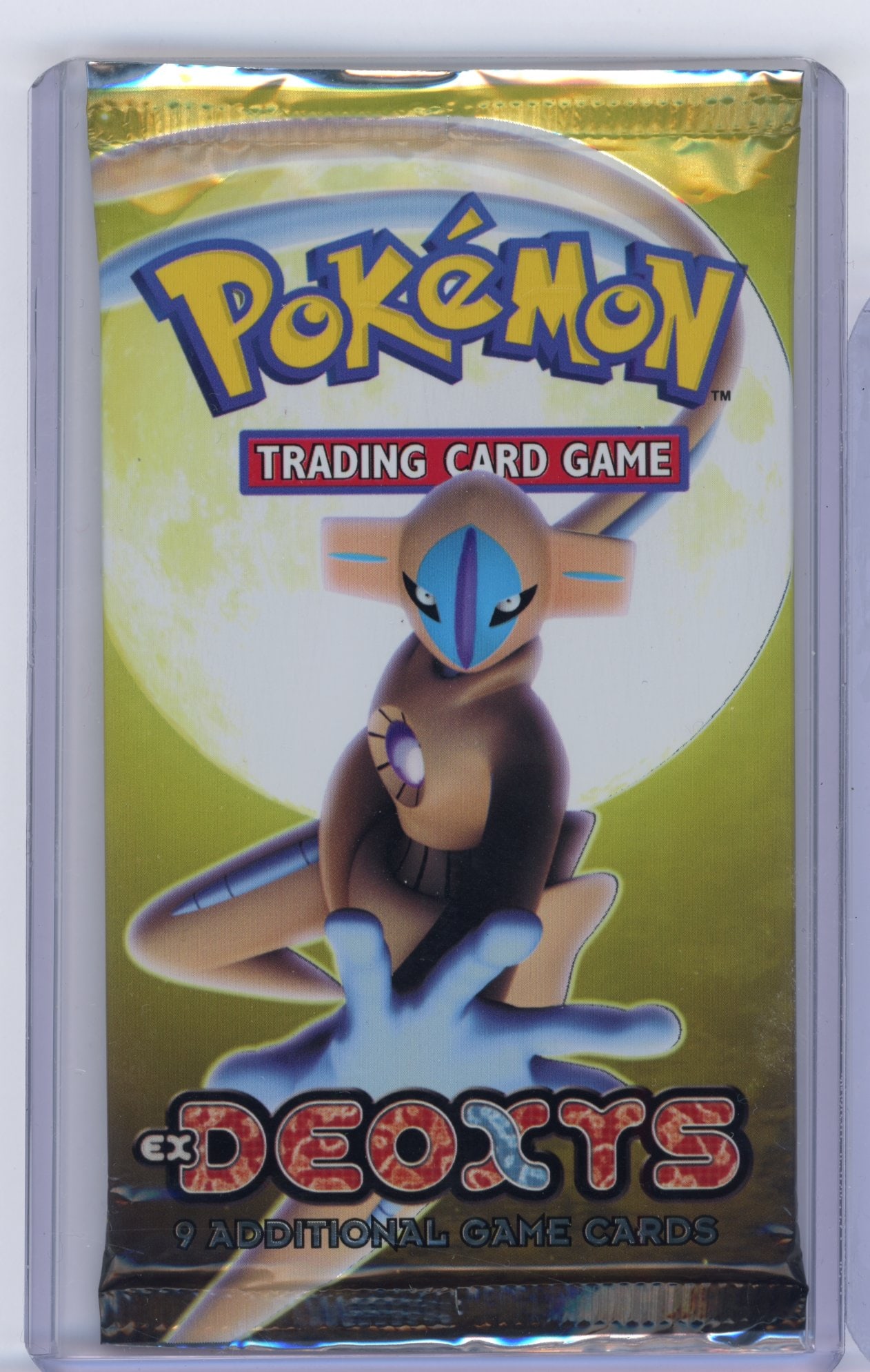 EX Deoxys Sealed Booster Pack - Deoxys Normal Forme Artwork (17.55g): An EX Deoxys Sealed Booster Pack, factory sealed and in excellent condition.This pack features the Deoxys Normal Forme Artwork, and comes in at 17.55 grams.
