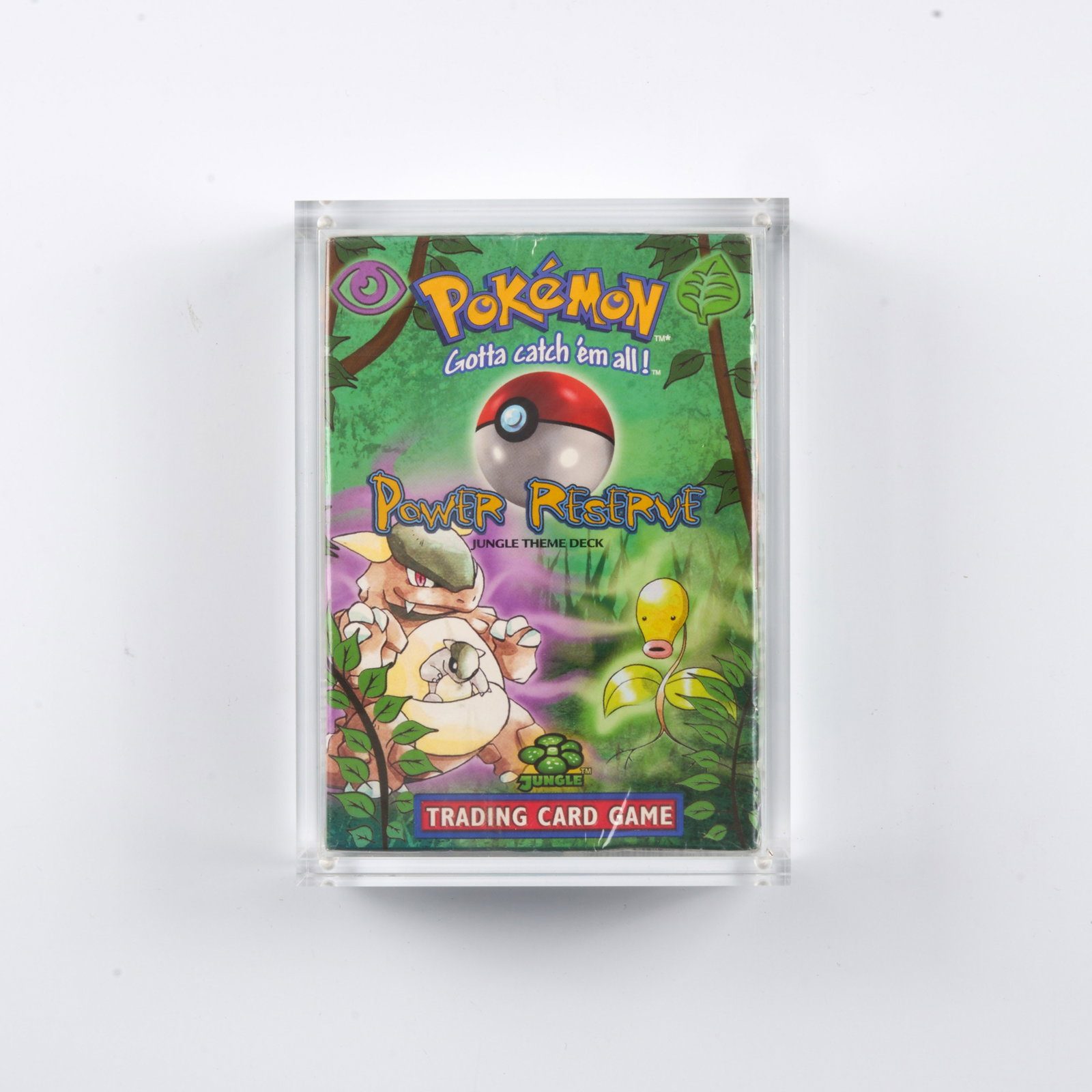 Power Reserve Theme Deck - Factory Sealed Inc. Acrylic Case: A factory sealed 'Power Reserve' Theme Deck, which includes a 60-card deck, damage counters, a custom coin, a rulebook, and a card list. Released June 16, 1999. This is a good example, looking bright 