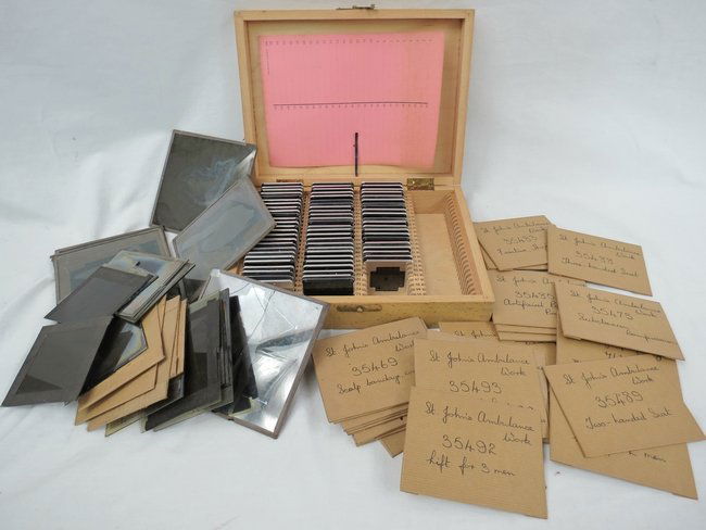 A quantity of early 20thC magic lantern slides, large f: A quantity of early 20thC magic lantern slides, large format images for use in medical lectures depicting various organs, joints and bones, slides 12 x 12cm, together with another group of standard fo