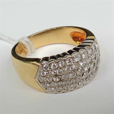 A five row pave set diamond half hoop ring, each small: A five row pave set diamond half hoop ring, each small brilliant separated by tear drop shaped setting. Total weight of diamond estimated 1.5cts. Shank stamped 750. Weight 8.2g.