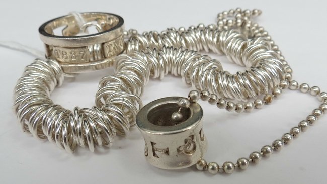 A Tiffany and Company set of necklace, associated bra: A Tiffany and Company set of necklace, associated bracelet and ring. 1.55ozt.