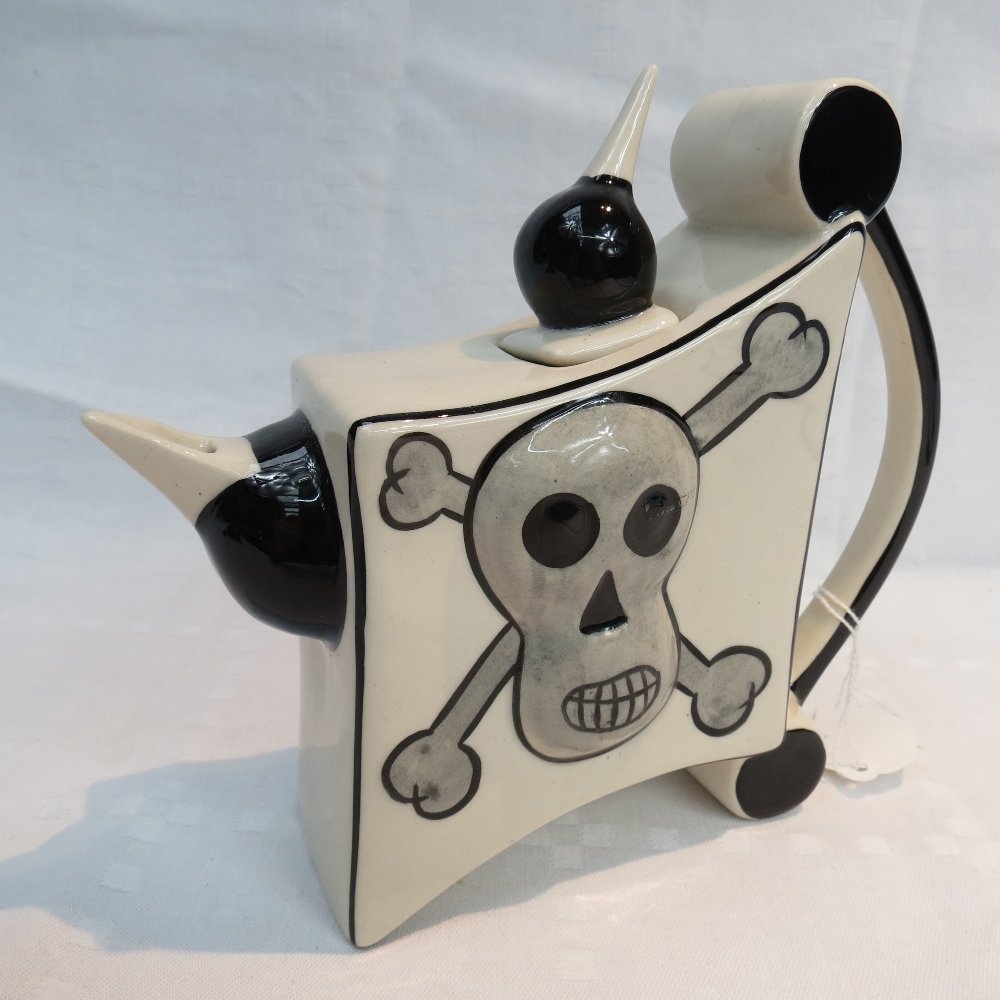 A Lorna Bailey teapot decorated with a pirate ship and: A Lorna Bailey teapot decorated with a pirate ship and a skull and crossbones, 18cm high.