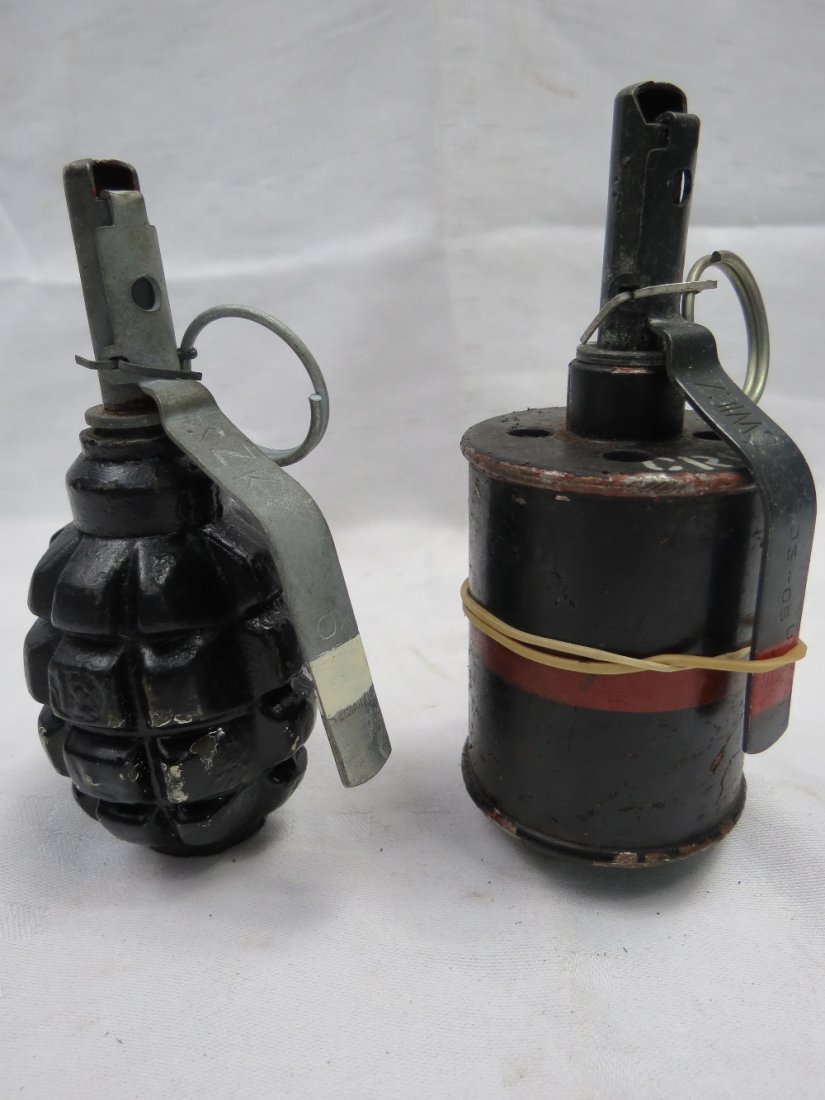 A pineapple type hand grenade together with another: A pineapple type hand grenade together with another cylindrical.