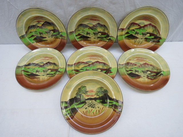 A set of six Empire Porcelain & Co 'Bonnie Scotland': A set of six Empire Porcelain & Co 'Bonnie Scotland' bowls, decorated with Highland cattle, 19cm dia, together with another 'Sunset Hour'.