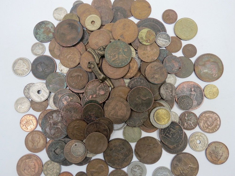 A quantity of UK and world coinage in copper, white: A quantity of UK and world coinage in copper, white metal and cupro nickel including a Robert Blake two pence token and an 1861 Nova Scotia one cent coin.
