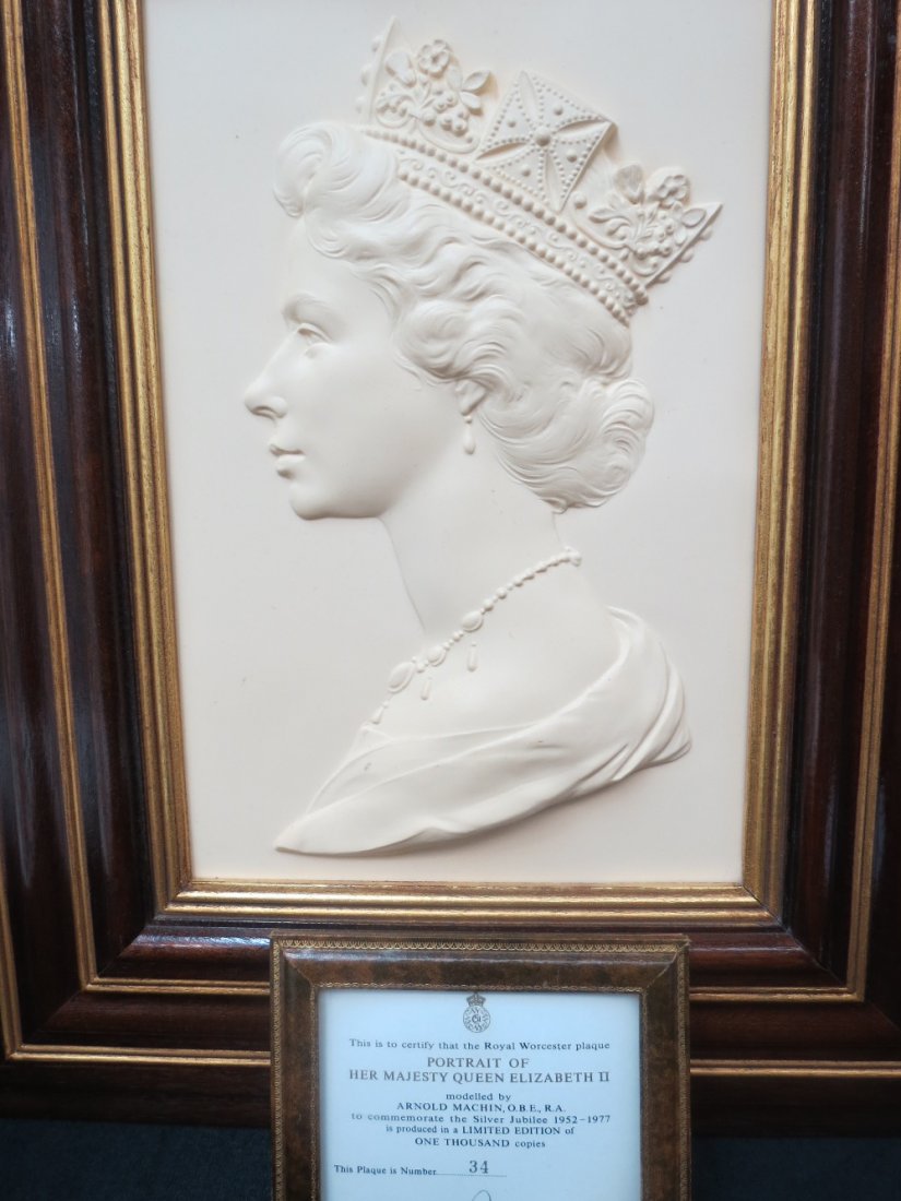 A Royal Worcester bas-relief portrait bust of Her: A Royal Worcester bas-relief portrait bust of Her Majesty Queen Elizabeth II by Arnold Machin O.B.E R.A., commissioned to commemorate the silver Jubilee 1952-77, number 34 of a limited edition of 1,00