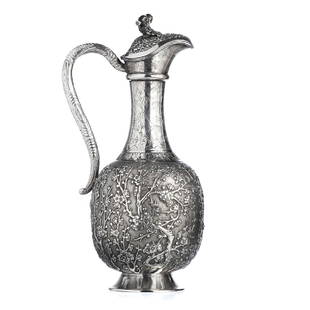 Chinese Silver Plum Blossom Wine Ewer, 19thC: Chinese silver from the second half of the 19th century, marked 850, goldsmith "CW", Cumwo, from Hong Kong, and with ideogram. Relieved chased decoration with plant motifs, log-shaped pommel. Signs of