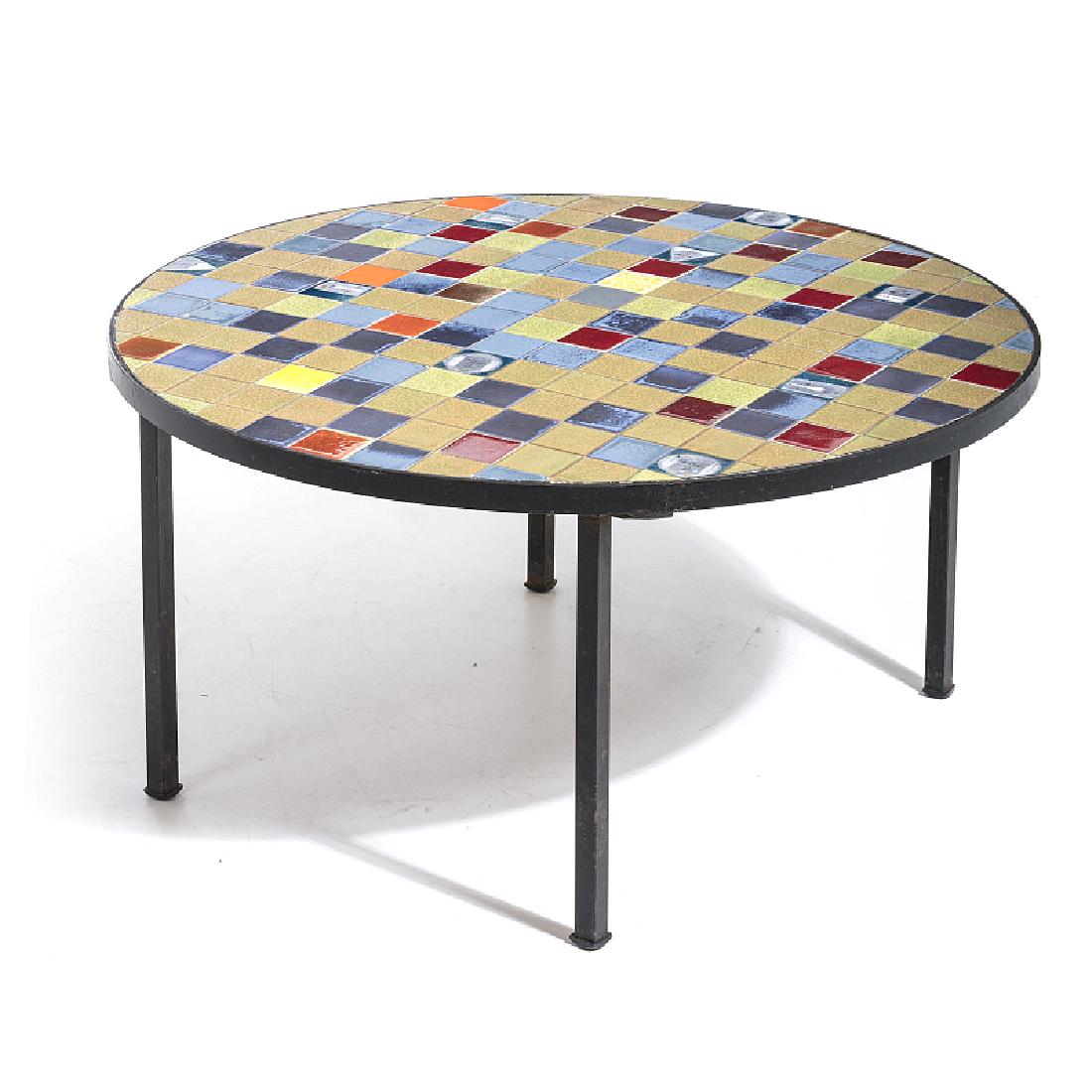 ROGER CAPRON (1922-2006) - Figurative coffee table: France, c. 1960, structure in black-patinated iron, top with tiles in polychrome glazed ceramics with figurative representations. Minor loss. Dim.: 42x79.5 cm.
