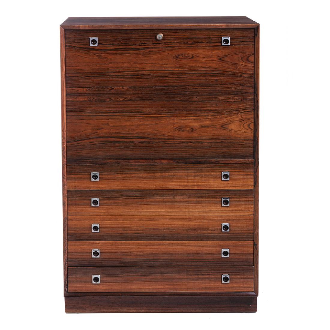 ARNE VODDER (1926-2009) - Desk/commode: Denmark, c. 1960, kingwood and other woods, commode with five drawers and a tilting door, and with a desk. Signs of wear. Dim.: 118.5x47x76 cm.