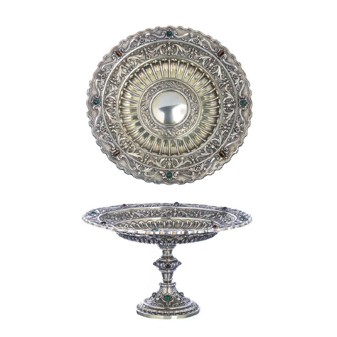 DAVID FERREIRA â€” Tazza in silver: Vermeil, an 833 eagle assay marking (1938-1984), JosÃ© Pereira Reis (reg.1916) as goldsmith, marked "David Ferreira, Porto", a scalloped rim, a relieved decoration with cartouches, scrolls, and flow