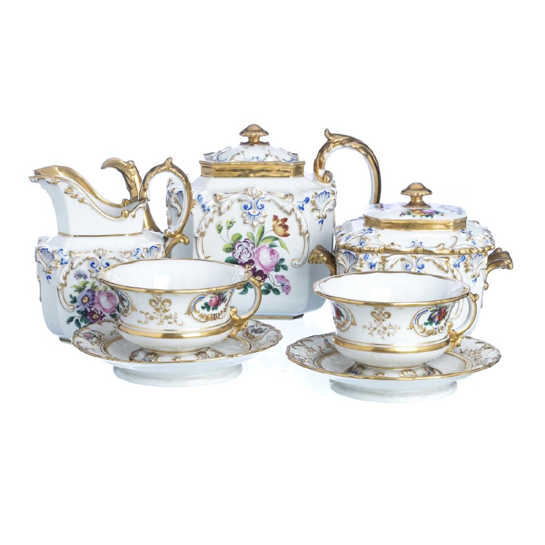 Porcelain tea service Jacob Petit: Porcelain tea service Jacob Petit French molded porcelain, 19th century, decorated decoration, polychrome and gold, reserves with flowers, for six people. Marked 'JP'. Minimal hair in two cups, one wi