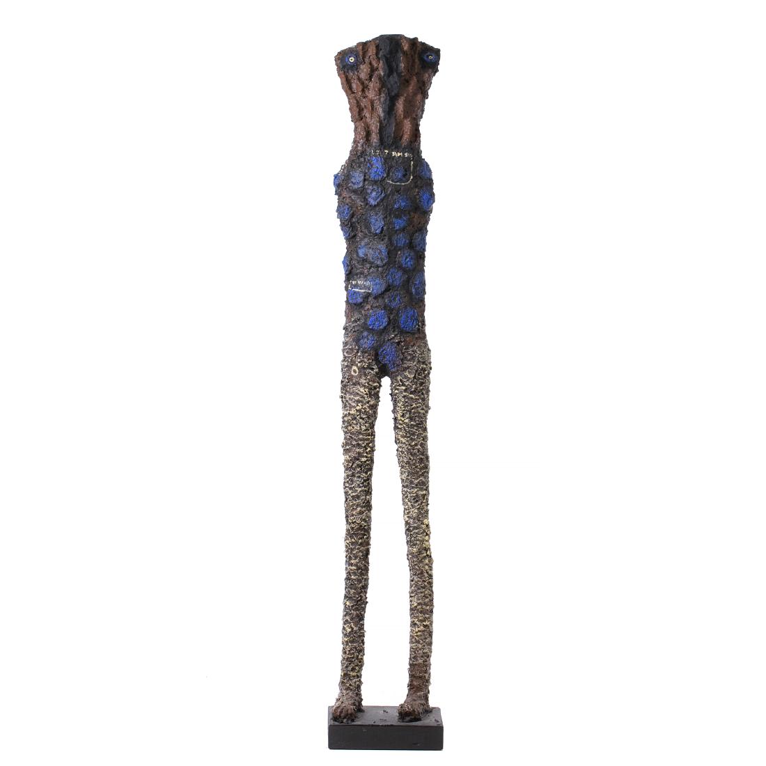 SOLY CISSE (b.1969) - 'Standing man': Sculpture carved and painted wood, base in wood and metal, signed and dated 2003 at the base. Dim .: 162cm.