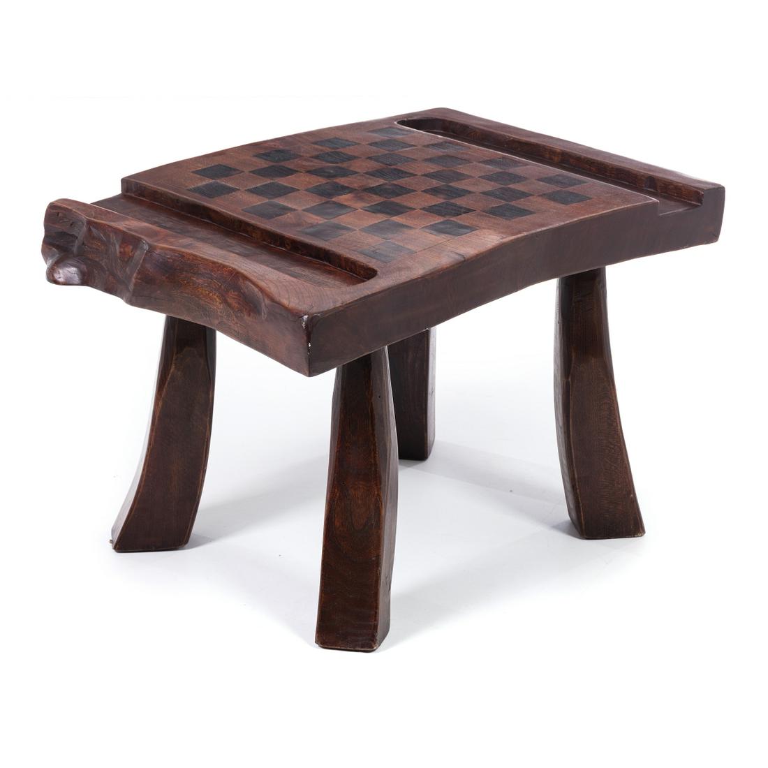 Style of ALEXANDRE NOLL (1890-1970) - Chess low table: French, c.1950, carved oak trunk with part darkened chess top table. Dim .: 46x71x50cm.