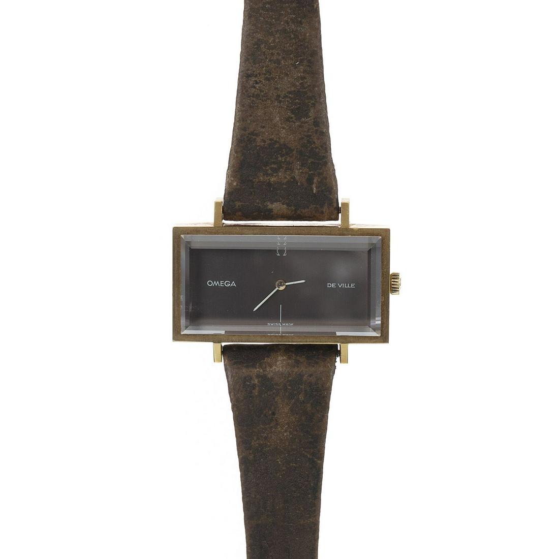 OMEGA - DeVille Mirror Watch: Wristwatch designed by Andrew Grima, steel case and 18K gold plating, Helvetia assay marking, manual winding, sapphire glass, brown leather strap, working. Marked. Signs of wear. Display dimension: 2x