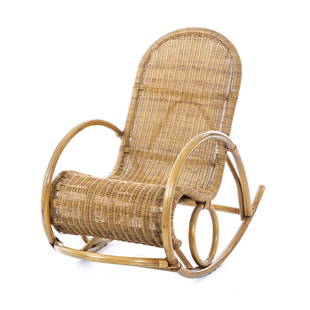 ROHE NOORDWOLDE - Bamboo and wicker rocking chair: Holland, c.1960, in interlaced wicker and bamboo cane. Signs of use. Dim.: 99x105x60 cm.