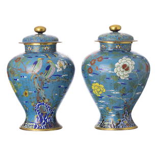 Pair of Chinese cloisonne lidded pots: China, 19th century, in metal decorated with cloisonne polychrome enamels, with floral and bird motifs. Signs of wear, lack of enamels. Dim.: 41 cm