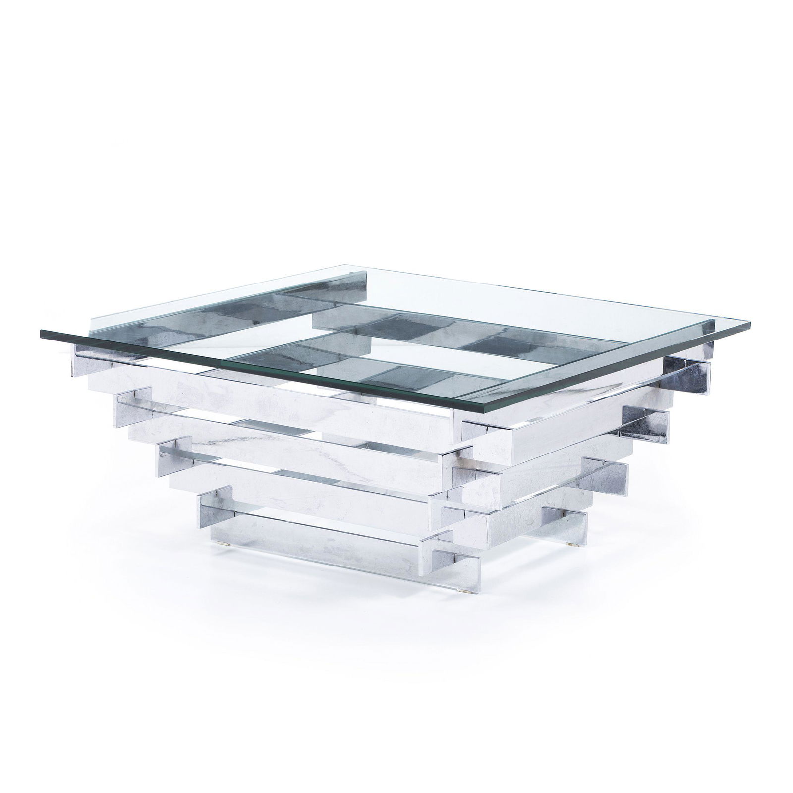 DAVID HICKS (1916-2000) - 'Tavolo Scultura' coffee table: Italy, c. 1960, structure in chromed metal strips, glass top. Signs of wear. Dim: 47.5x105x105cm