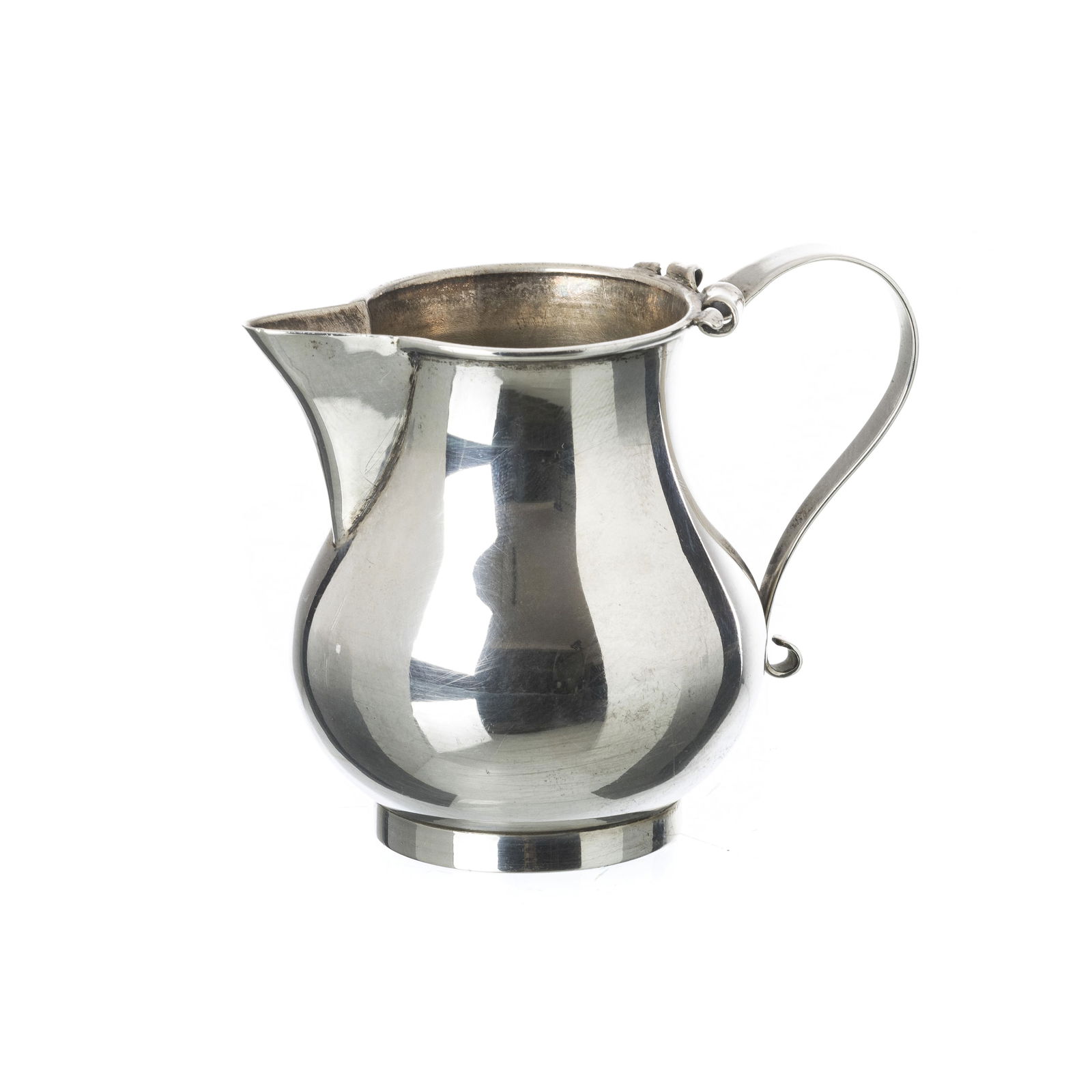 LUIZ FERREIRA (1909-1994) - Small silver jug: Portuguese silver, eagle hallmark 833 (1938-1984), goldsmith's mark Delmar Gomes Pinheiro (1945-1981) and goldsmith's mark 'David Ferreira Porto', handle with relief decoration with scrolls, marked 'L