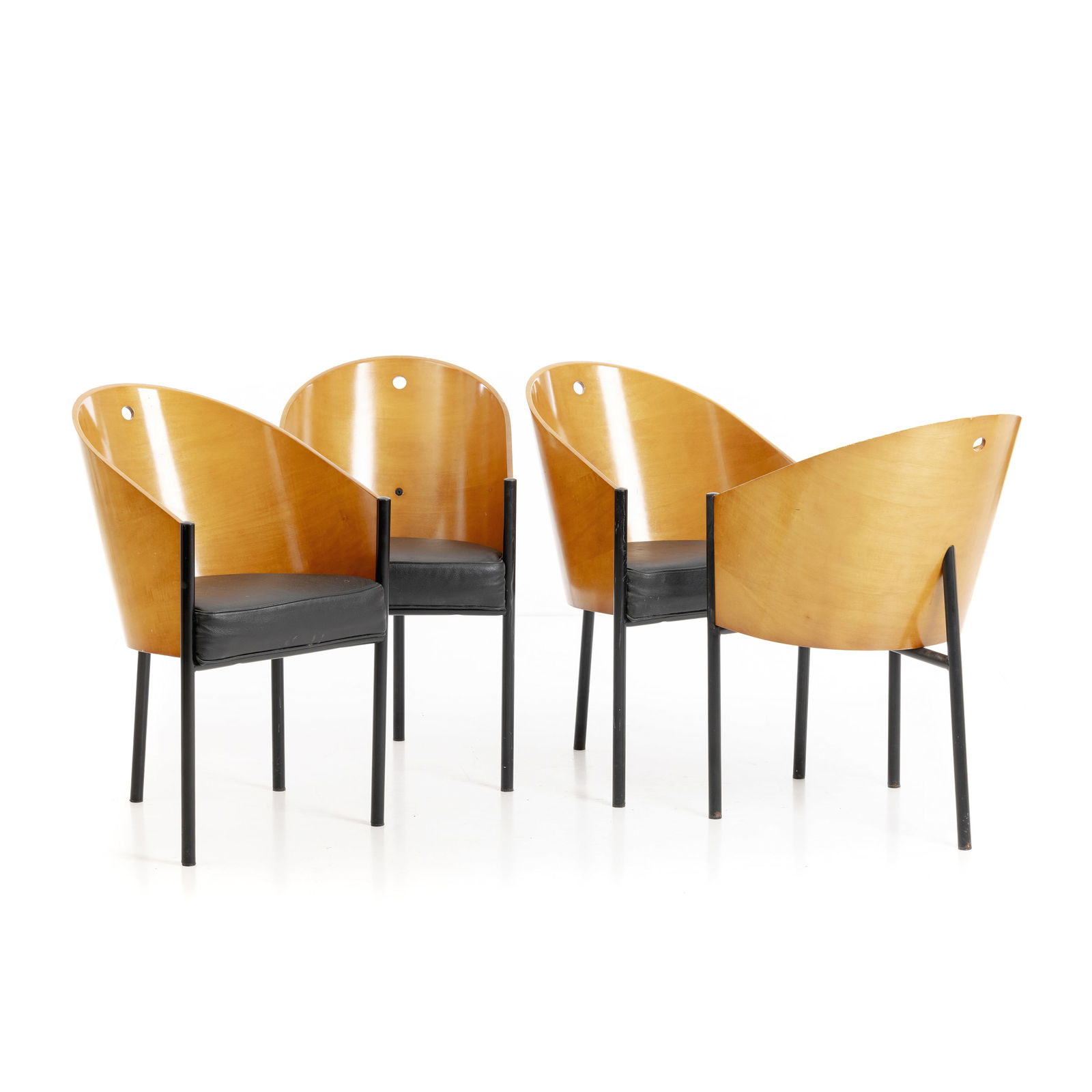 PHILIPPE STARCK (b.1949) - Four Costes chairs: France, c.1980, in teak, with black lacquered metal legs and leather upholstered seats, manufactured by Dr?ade. Signs of use, minor flaws. Dim.: 80.5x46.5x52.5cm.