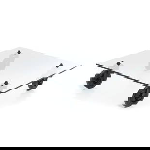 GAE AULENTI (1927-2012) - ?Tavolo con ruote? coffee table: Italy, c.1980, in glass with four castors, made by Fontana Arte. Signs of use. Dimensions: 25x100x100cm.