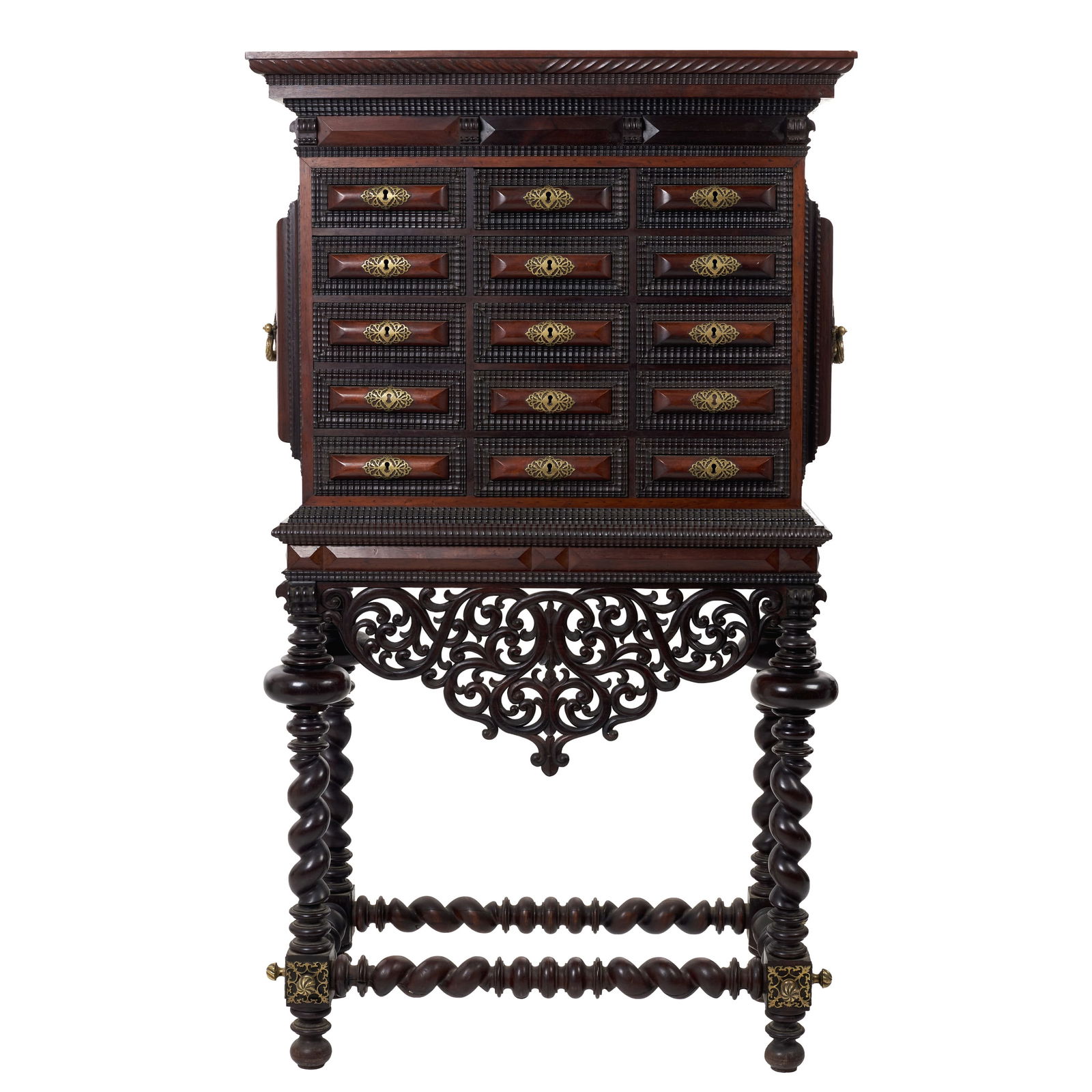 Large rosewood Cabinet on stand: Portugal, 19thC, carved rosewood, front with 11 drawers simulating 15, apron pierced with vegetal motifs, legs and stretchers with turned and twisted decoration, pierced and gilded metal fittings.