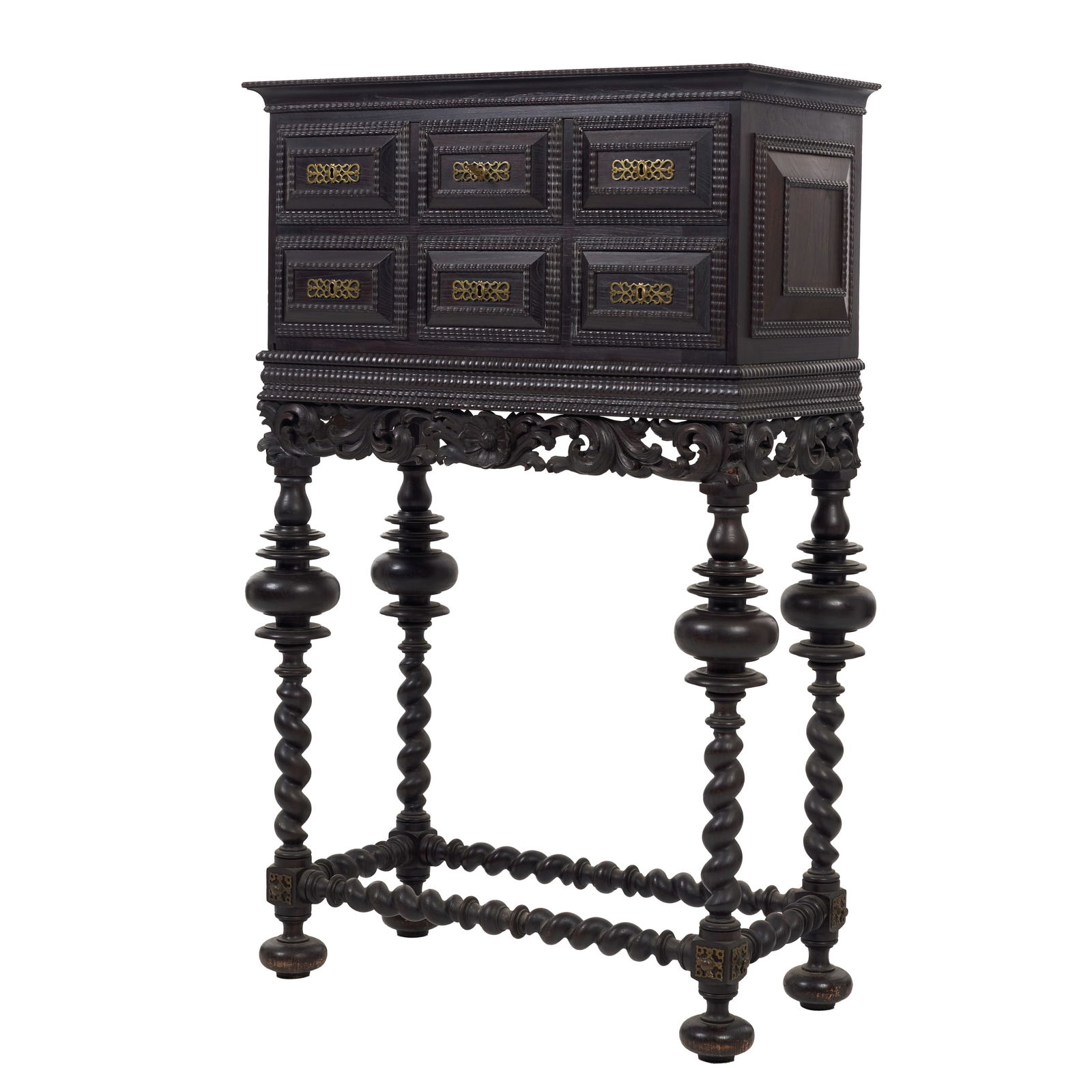 Chestnut cabinet: Portugal, 19th/20th century, in carved chestnut, with vegetal motifs, front with door simulating 6 drawers, turned legs and stretchers, pierced and gilt brass fittings, interior with compartments and