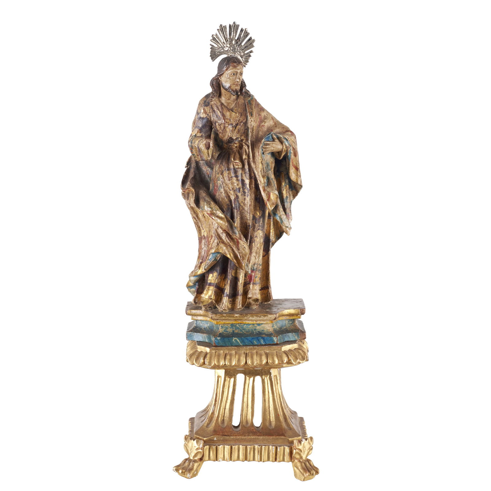 Saint Joseph: Portugal, 18th/19th c., carved polychrome and gilded wood, with a silver halo, base in carved openwork gilded wood. One hand missing minor losses in the polychromy. Dim.: 39 cm.
