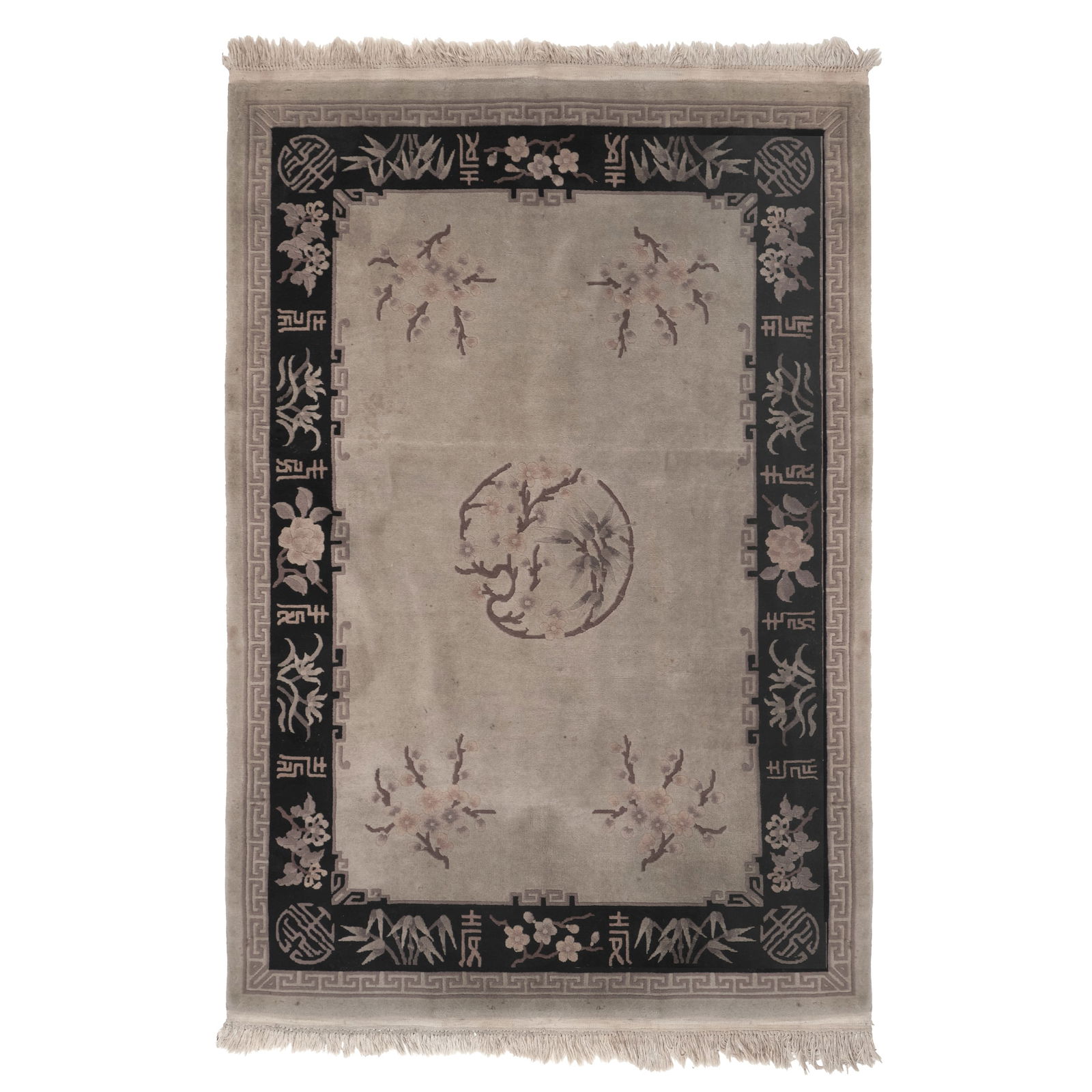 Chinese wool Rug: Chinese rug, China, 20th century, Minguo, polychrome wool yarn, beige background with black frieze, decorated with floral elements. Signs of wear. Dim.: 200x137cm.