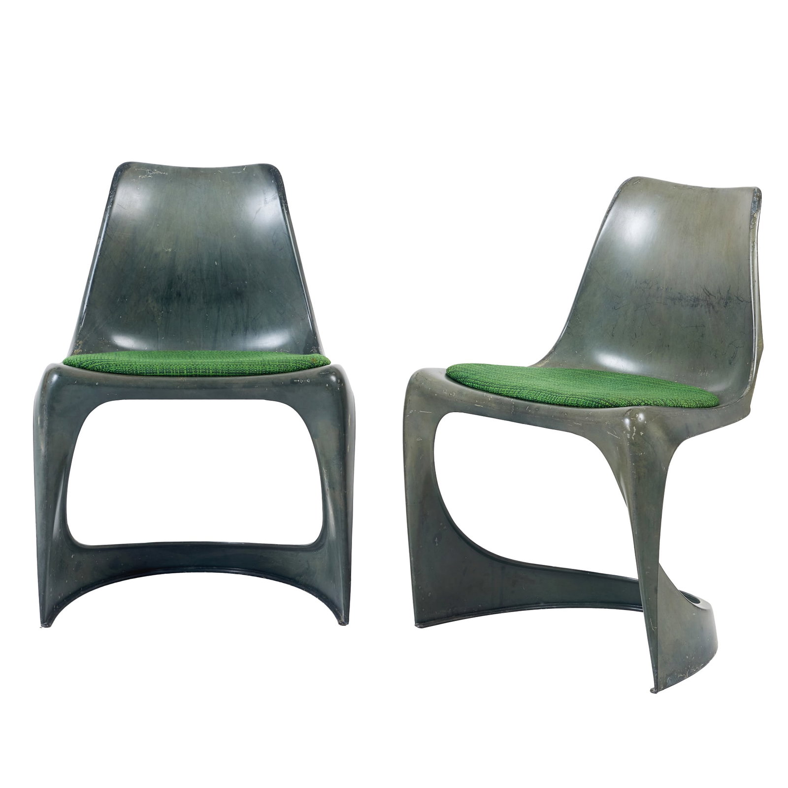 STEEN OSTERGAARD (b. 1935) - Two 'A-Line 290' chairs: Denmark, c. 1960, plastic frame, removable seats upholstered in green fabric, designed by Steen ?stergaard for Cado. Color wear, signs of use. Dim.: 74x49x39cm.