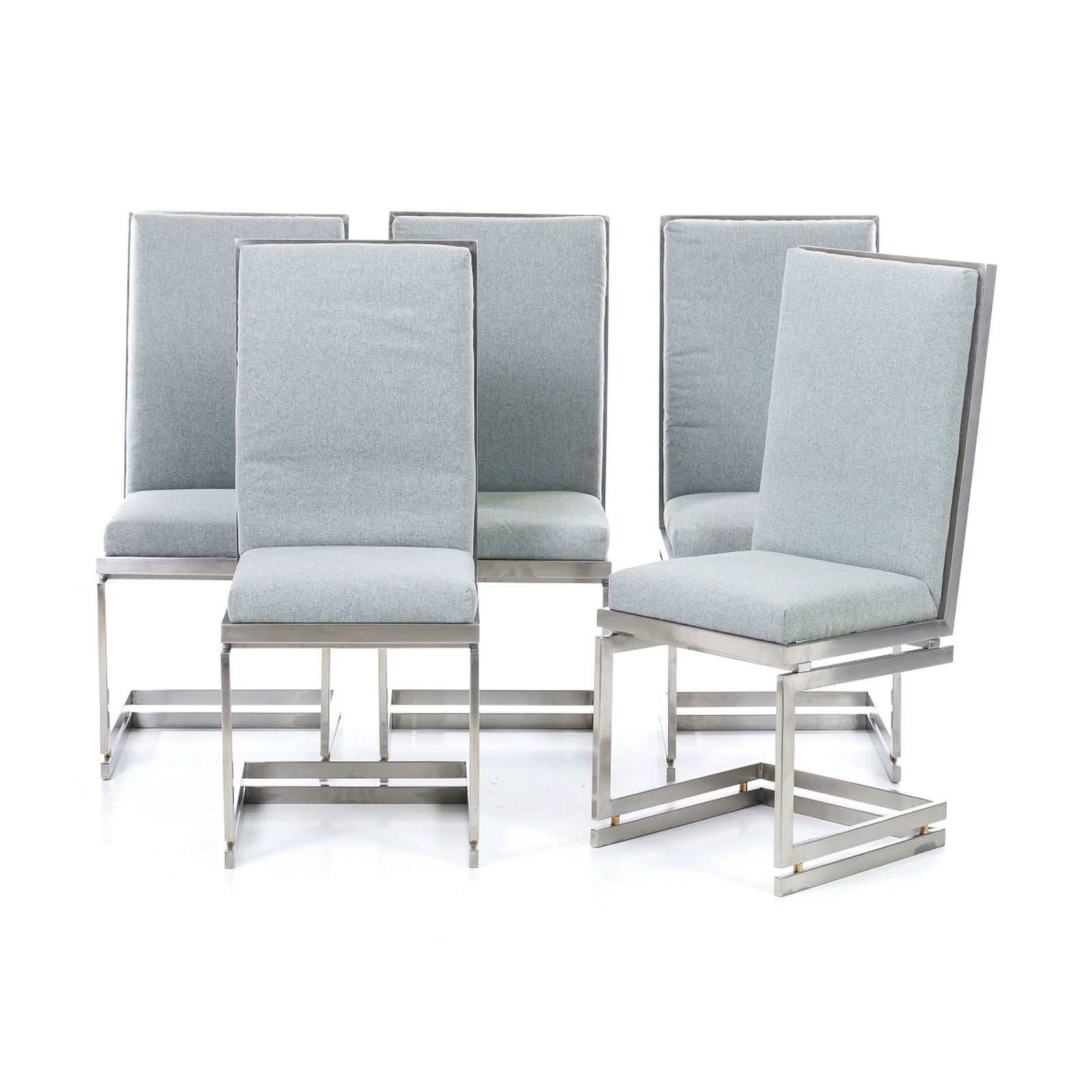 ROMEO REGA (1904-1968) - Five dining chairs: Italy, c.1970, linear structure flattened in brushed steel and brass, velvet upholstery. Dim .: 94x40x43cm.