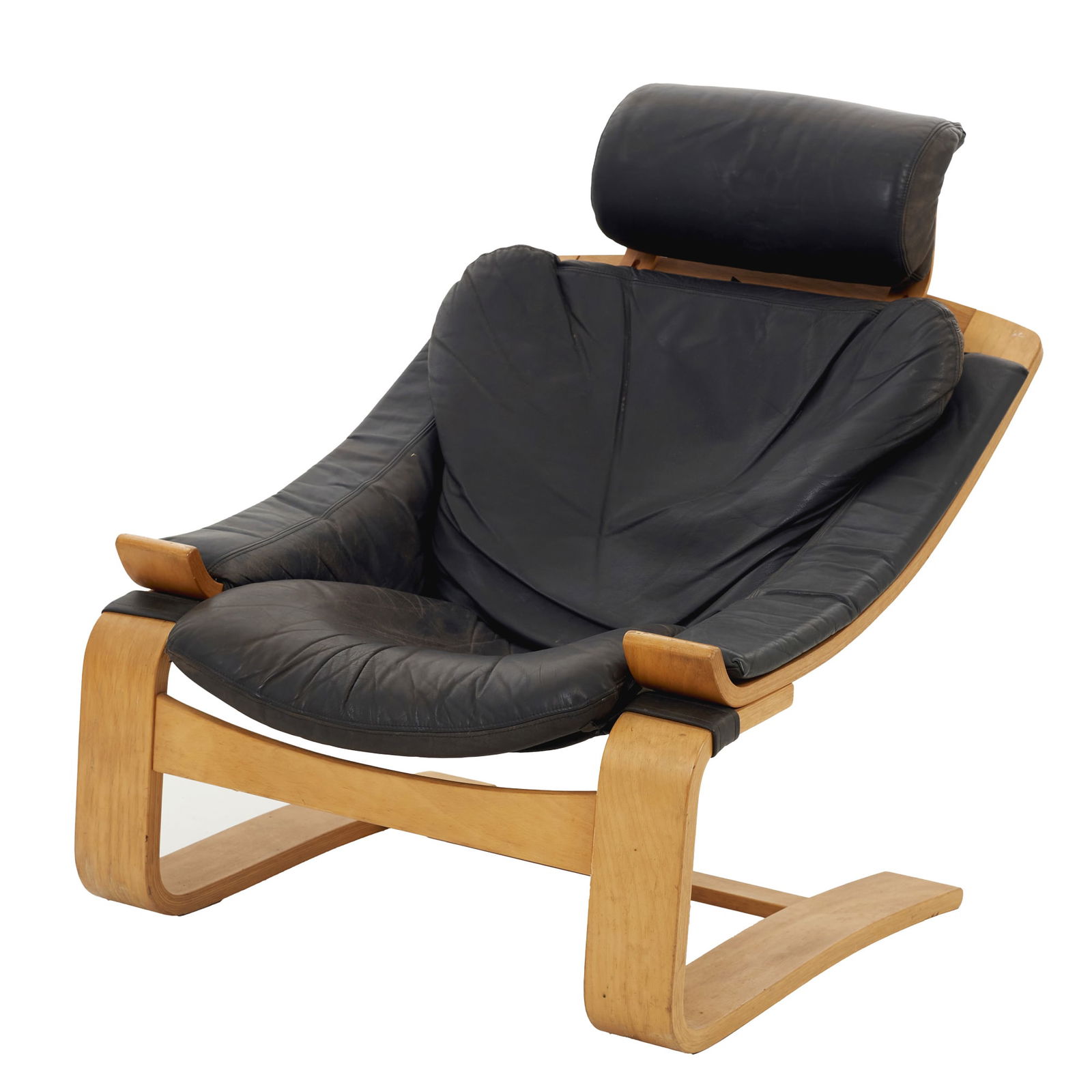 AKE FRIBYTTER (1922-1988) - 'Kroken' Armchair: Sweden, c.1970, designed by Ake Fribytter for 'Nelo Mobel', with a curved beech frame and black leather upholstery. Signs of use. Dim.: 90x76x74cm.