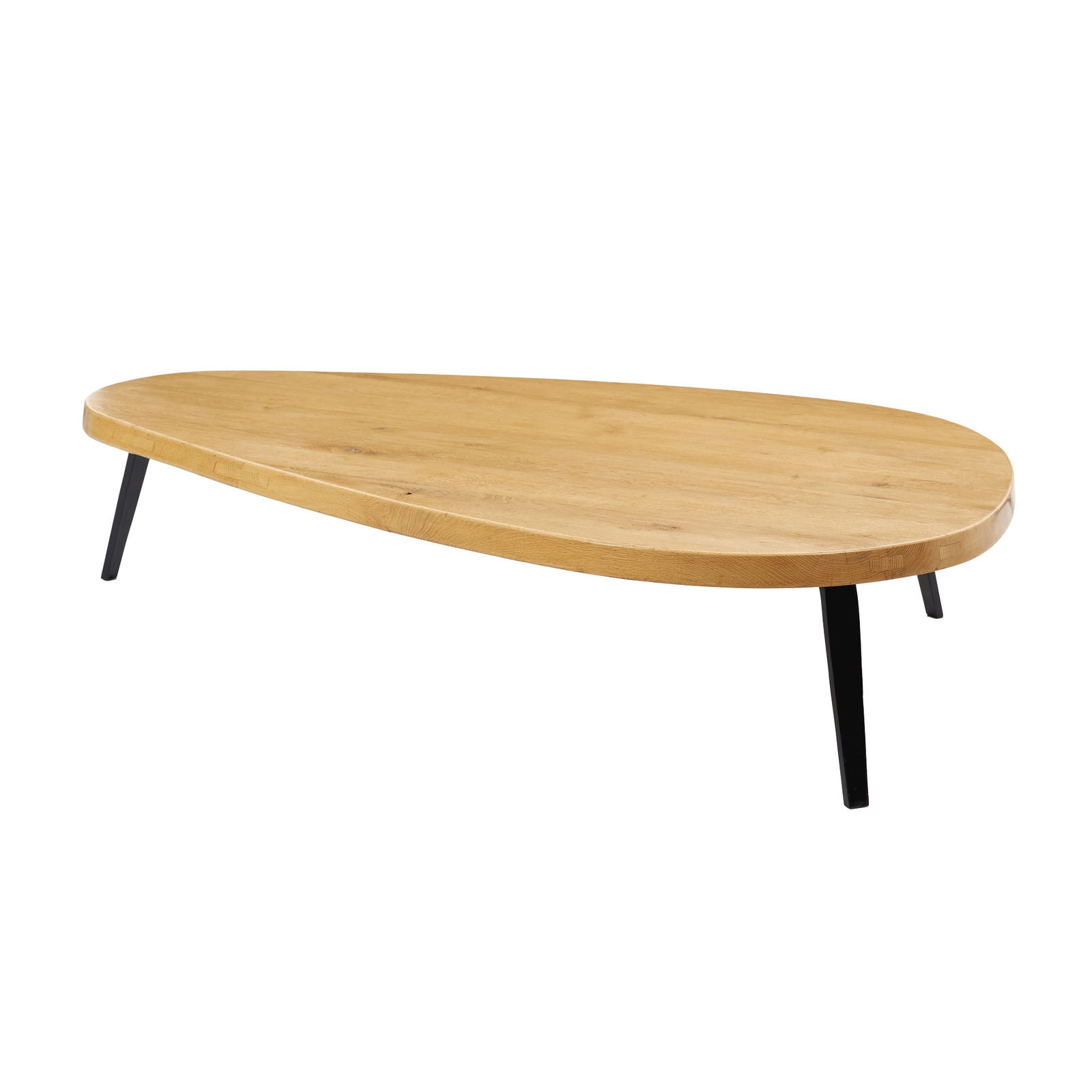 Style of CHARLOTTE PERRIAND (1903-1999) - Freeform coffee table: France, c.1990, in oak, free form, three legs in black lacquered metal. Signs of use. Dimensions: 36x165x105cm.