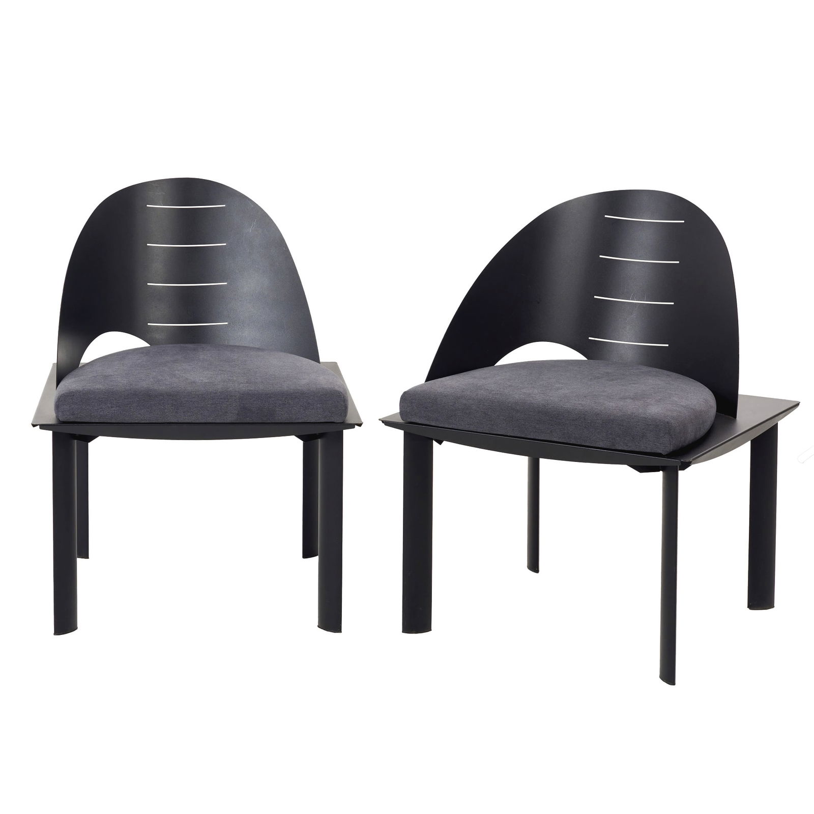 PATRICE BONNEAU (1962) - Pair of fauteuils: France, c.1980, pair of 'Genexco' edition chairs, in black lacquered metal, with asymmetrical backrest and dark grey cushion. 'Genexco / Made in France' label. Signs of wear. Dim.: 76x57.5x57.5cm.