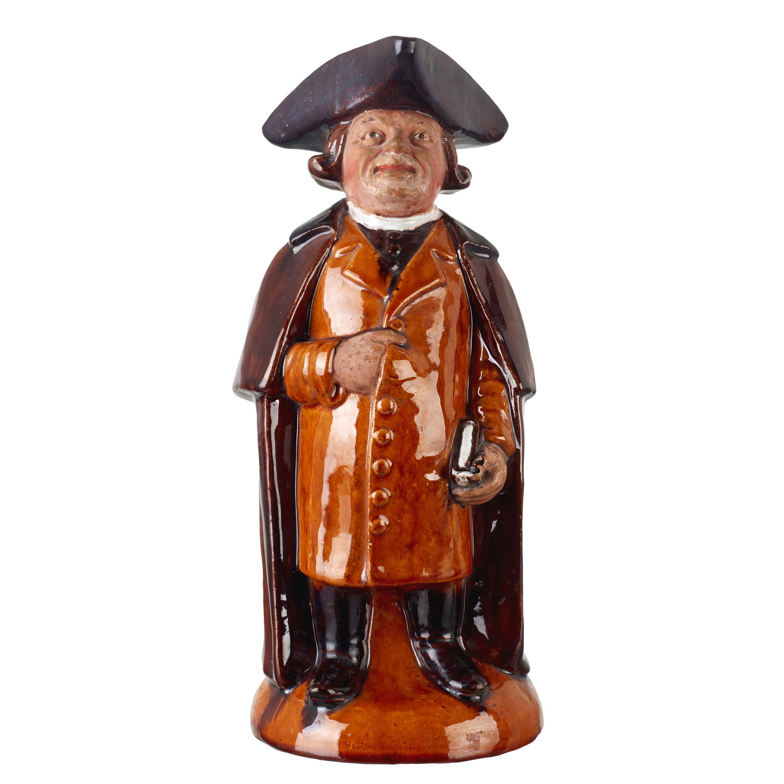 Caldas earthenware Toby Jug: Caldas da Rainha earthenware, 19th/20th century, polychrome glazed decoration, depicting a figure wearing a tricorn hat and holding a book. Signs of use. Dim.: 28.5cm.