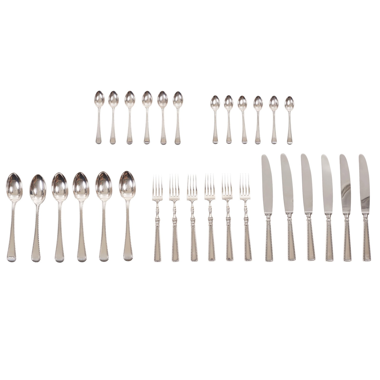 Part of a cutlery set for 6 people.: Portuguese silver, eagle hallmark 833 (1938-1984), border decoration. Total weight approx.: 1793g. Dimensions: 12.5 to 19cm.