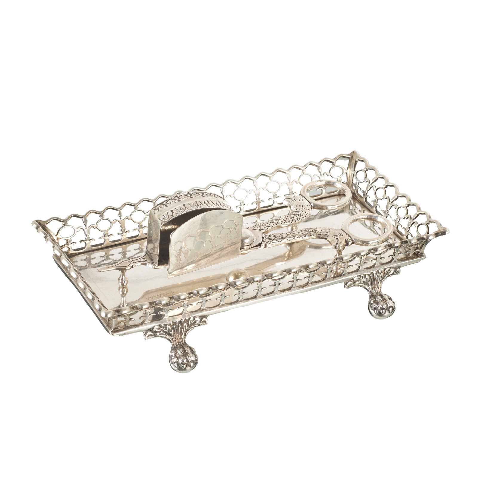 Silver snuff tray and scissors from Lisbon: Portuguese silver, Lisbon assayer's hallmark (c. 1822-1843); scissors with silversmith's mark of Joao Ramos Ortiz (1810-c.1879). Openwork decoration, with raised and engraved zoomorphic motifs. Signs