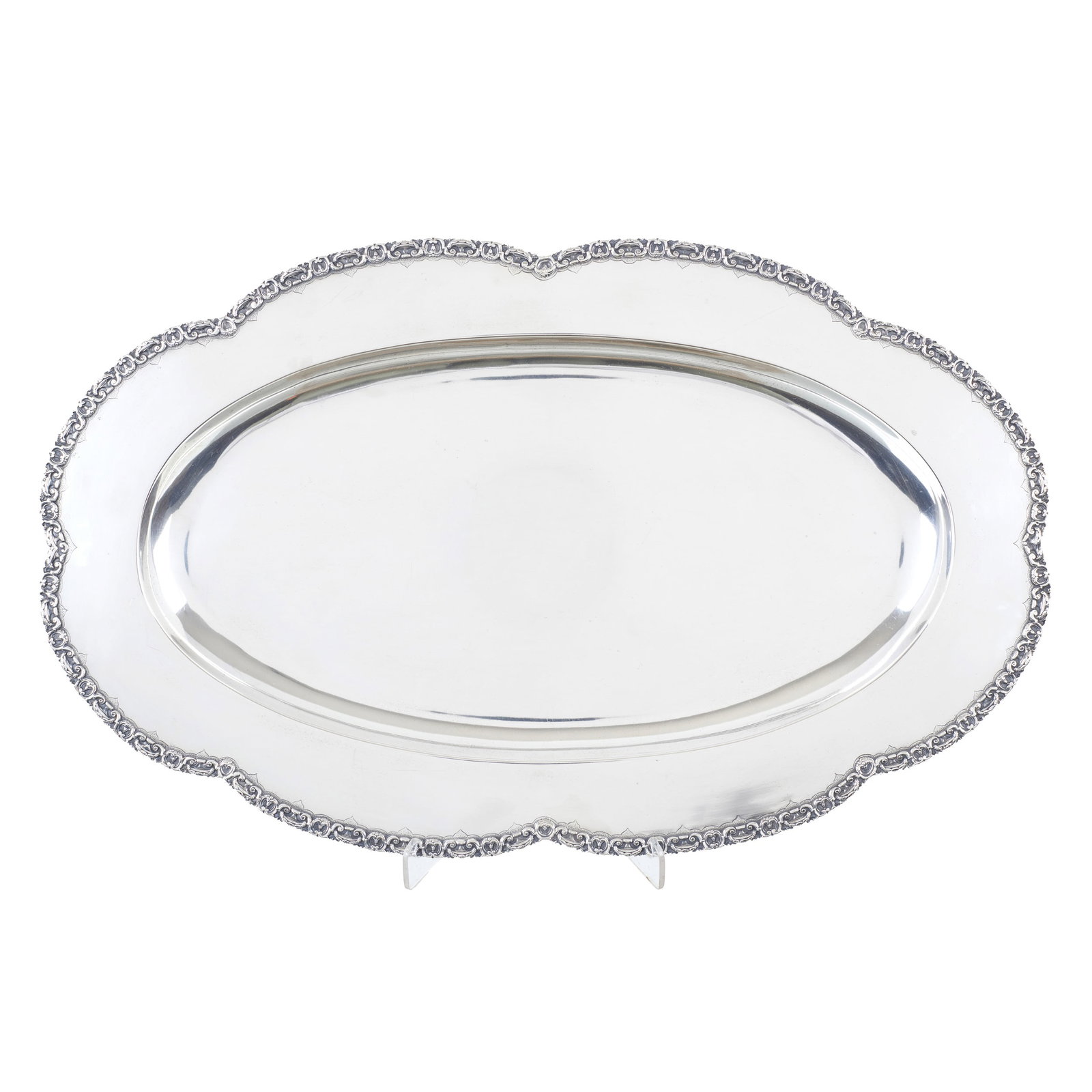 TOPAZIO - Silver Platter: Portuguese silver, 833 hallmark (1938-1984), silversmith?s mark of Ferreira Marques & Irmao Ld.? (reg. 1974); marked 'Topazio'; scalloped rim and raised frieze featuring plant motifs and scrolls.