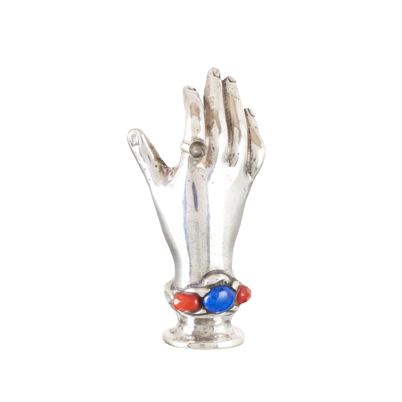 LUIZ FERREIRA (1909-1994) - 'Hand' seal in silver: Portuguese silver, 925 eagle hallmark (post-1985), silversmith?s mark of Jose Pereira Reis (1916-1990), 'LF' commercial mark; inlaid with semi-precious stones. Signs of use. Approx. Total weight: 103.
