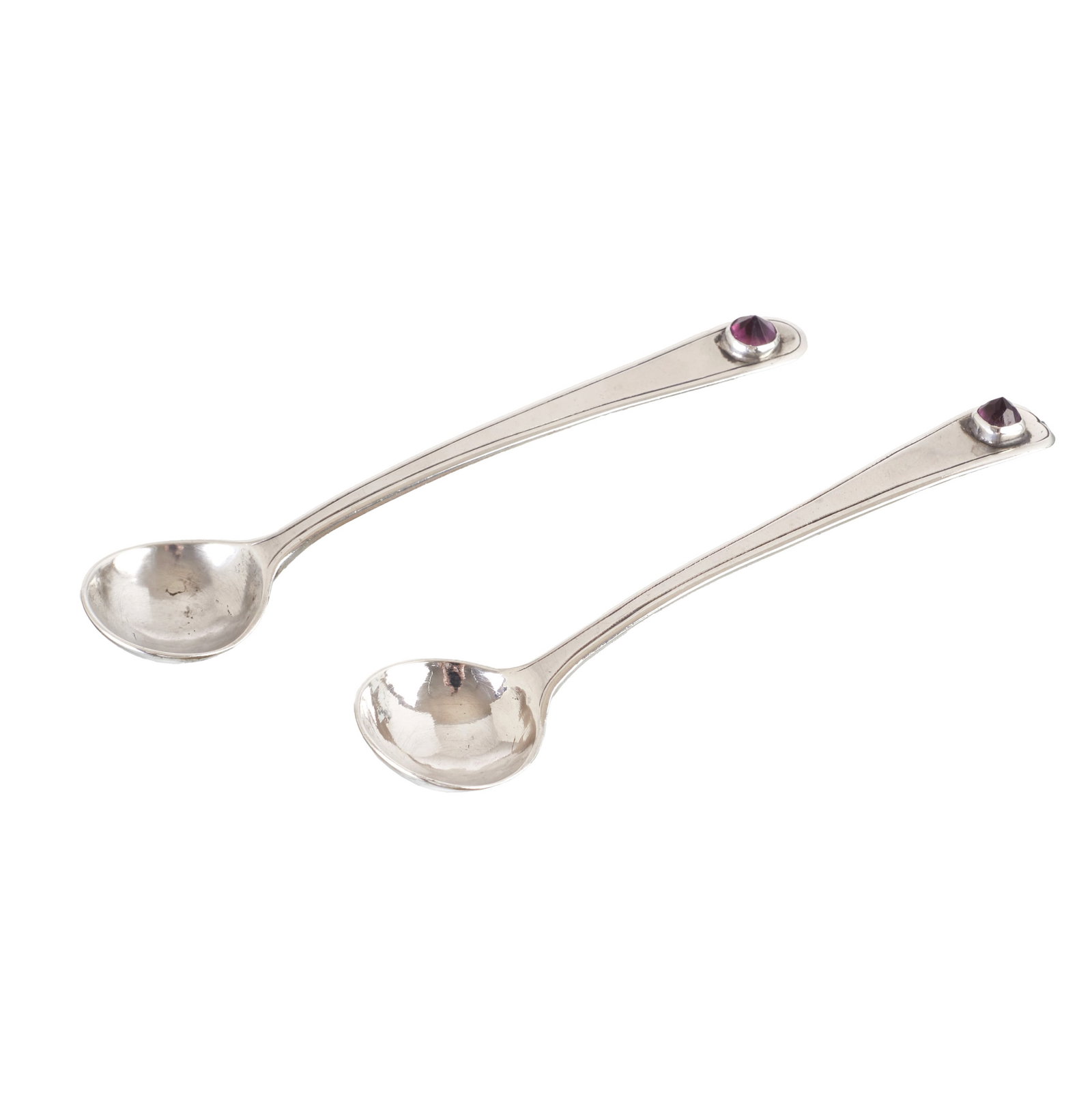Two silver spoons with amethyst: Portuguese silver, hallmarked by Port's assayer (1843?1853); one piece bearing the silversmith's mark of Luis Antonio Rodrigues de Araujo (1843?1853); another with an unidentifiable silversmith's